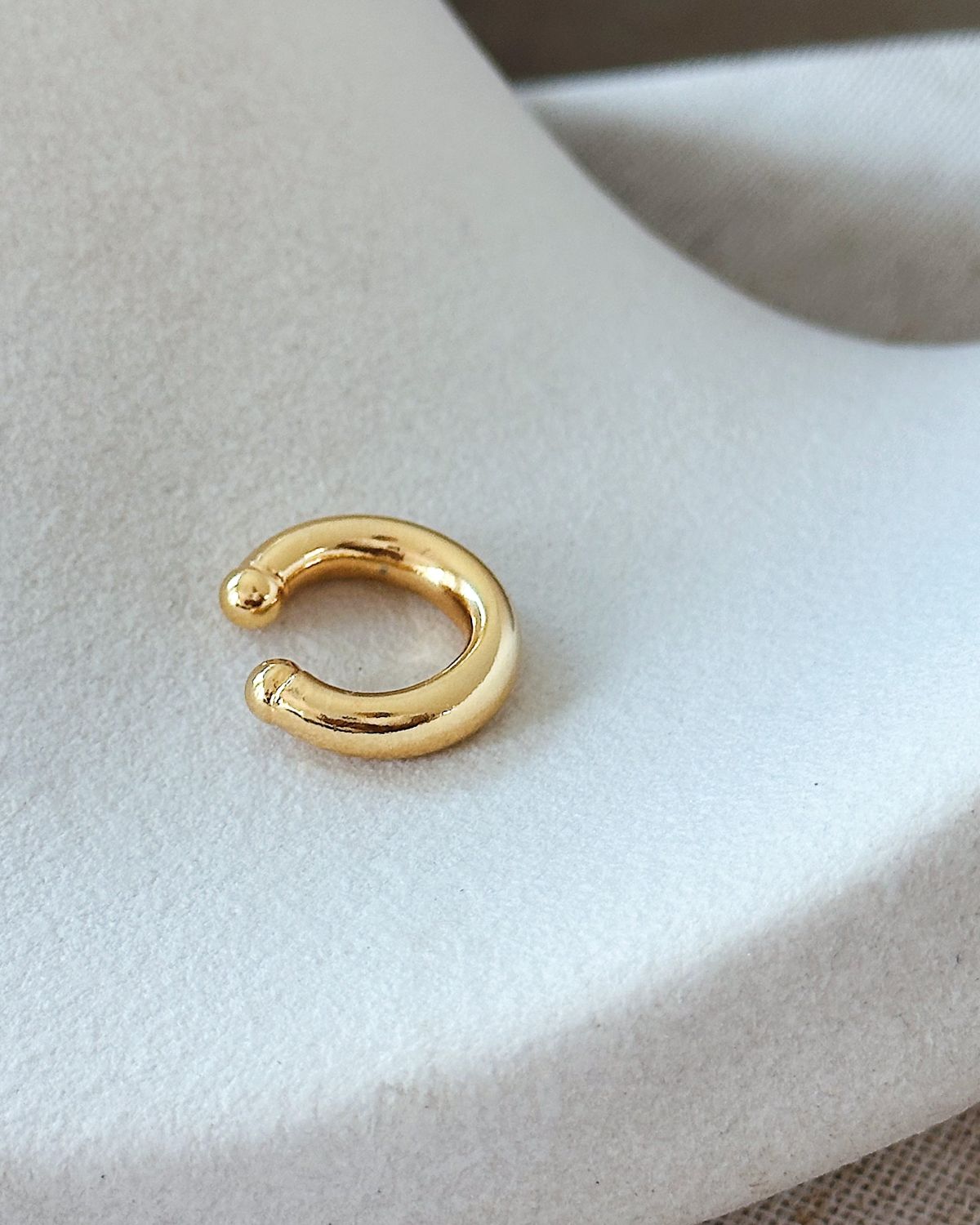 Piercing Fake Oclo Ouro